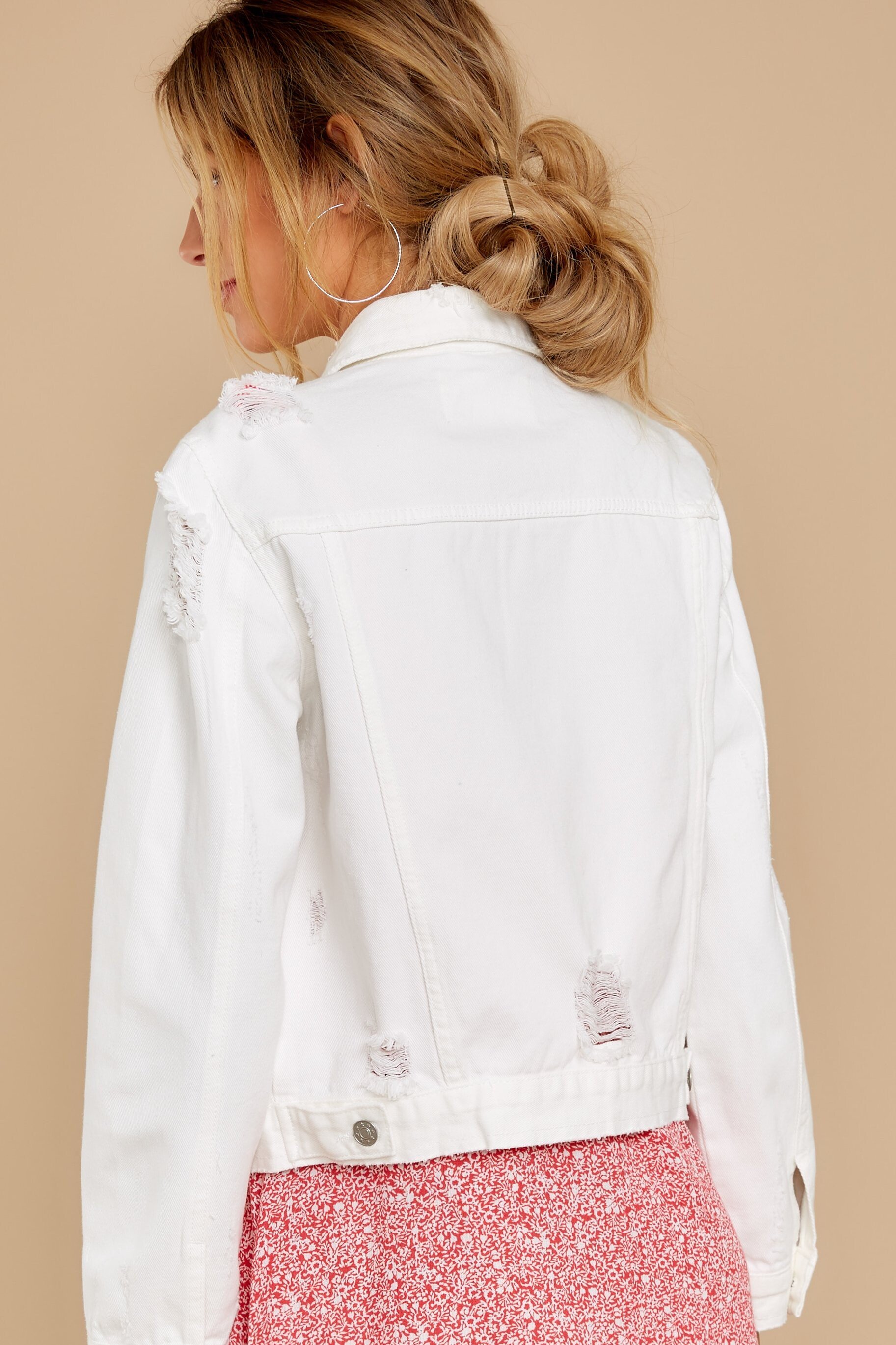 white ripped denim jacket