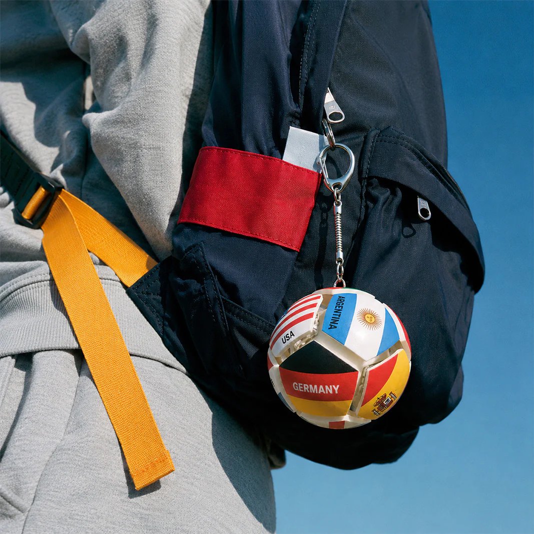 Football keychain on backpack