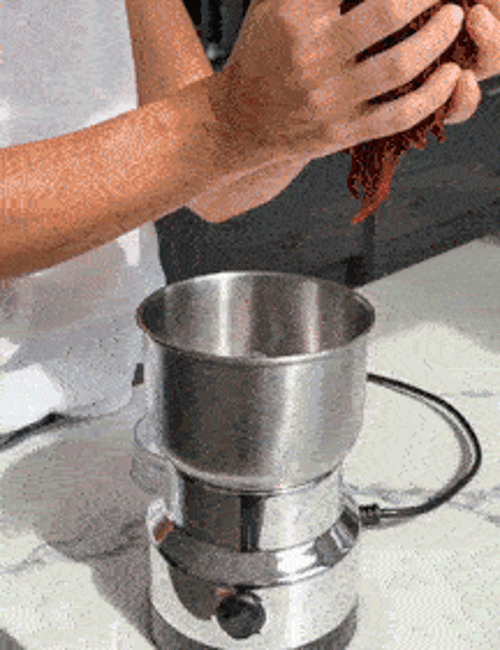 High-speed grinder demonstration GIF for dry spices grains and pantry ingredients