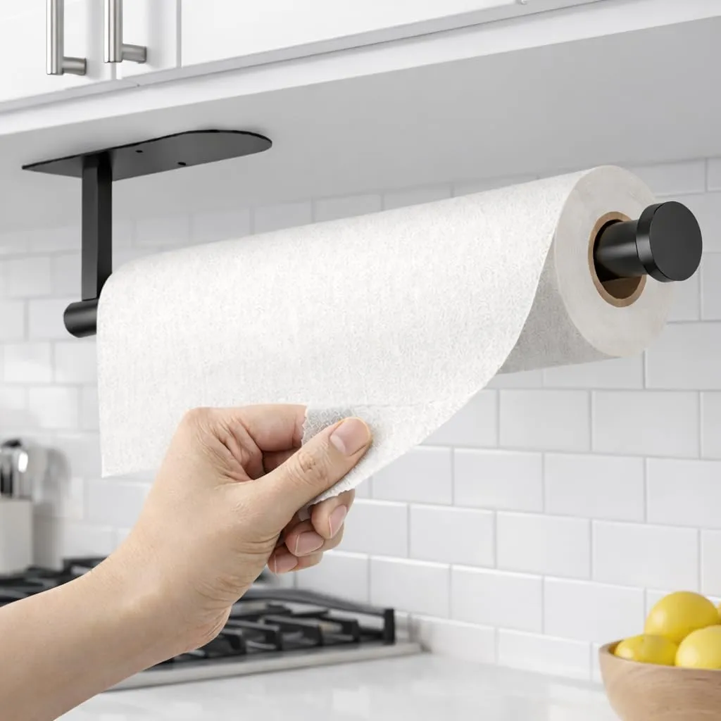 Paper towel holder mounted under cabinet