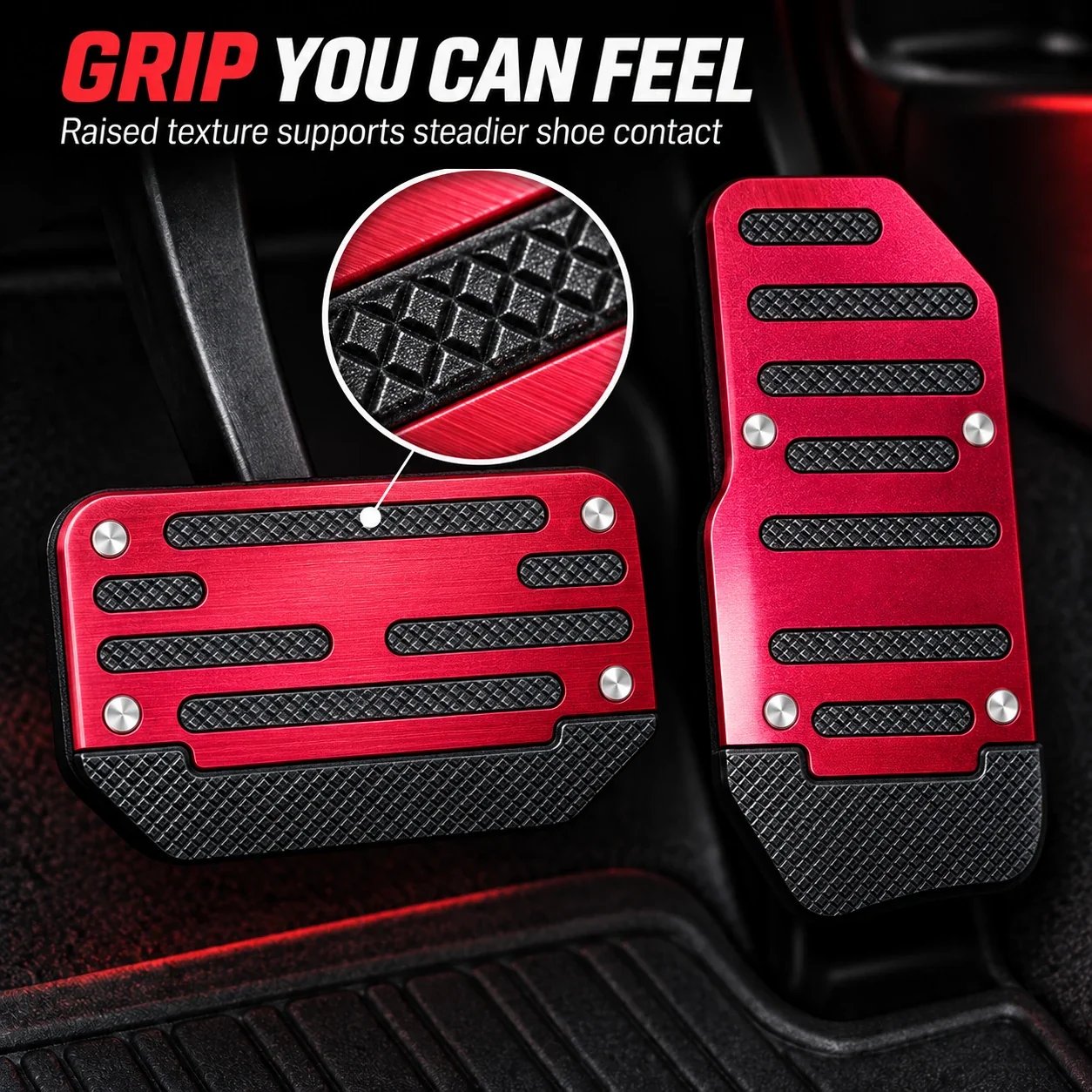 Close-up of raised black grip texture and slotted aluminum face