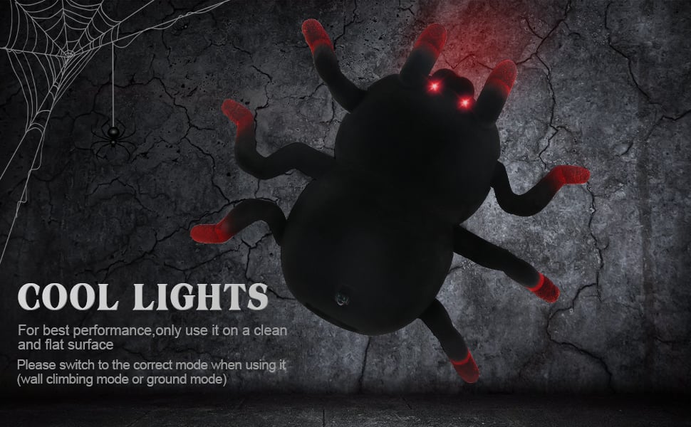 The remote control spider is climbing on the wall, the eyes light up!