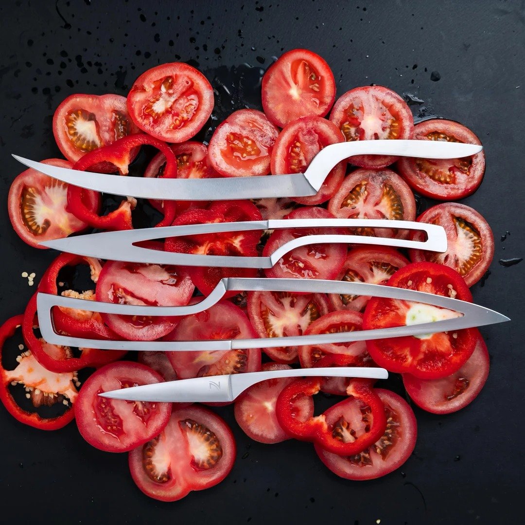 VG10 kitchen knife set with vegetables and food preparation